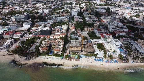 an aerial view of a beach and buildings at Hotel LunaSol in Playa del Carmen