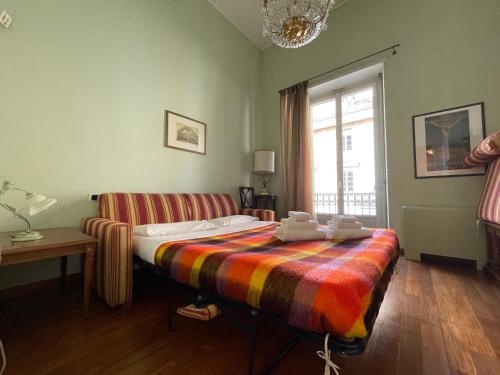 Ένα ή περισσότερα κρεβάτια σε δωμάτιο στο Castello Suite