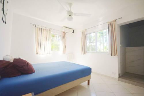 En eller flere senge i et værelse på Proche de tout, joli appartement