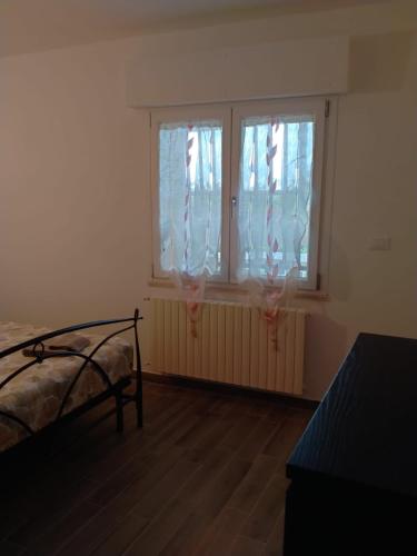 Postel nebo postele na pokoji v ubytování Villa Cecilia