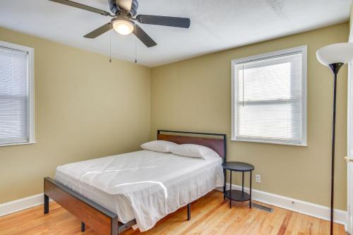 1 dormitorio con 1 cama y ventilador de techo en Augusta Home with Fenced Yard - 4 Mi to Downtown!, en Augusta