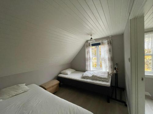 Postel nebo postele na pokoji v ubytování Sea-view house in Sund