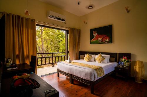 Lova arba lovos apgyvendinimo įstaigoje Citrus Prime Kanha Resort and Villas