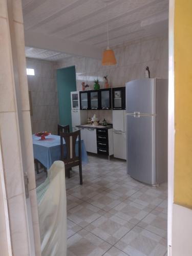 Η κουζίνα ή μικρή κουζίνα στο Tiowan House