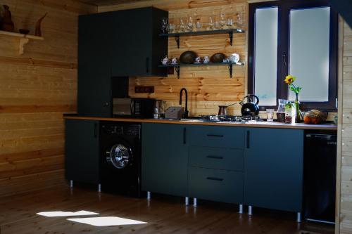 Kuchyň nebo kuchyňský kout v ubytování Cottage AISI / კოტეჯი აისი
