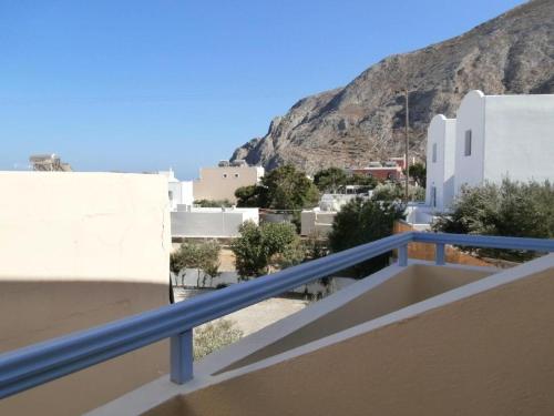 a balcony with a view of a mountain at Narkissos Hotel in Kamari