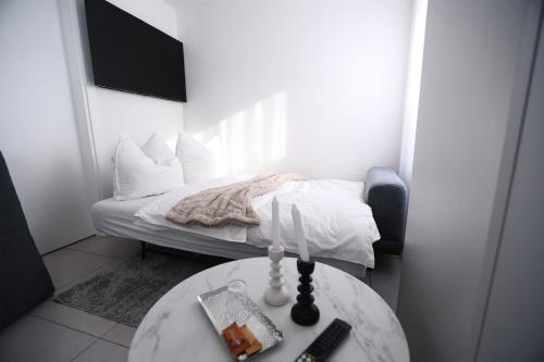 Ένα ή περισσότερα κρεβάτια σε δωμάτιο στο JAM Apartments
