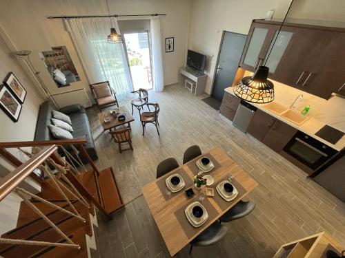 an overhead view of a living room with a table and chairs at Easy Living 1 & 2 in Kos Town