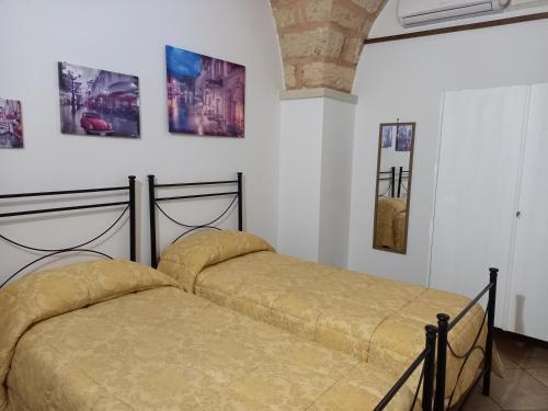 A bed or beds in a room at Curti Russi