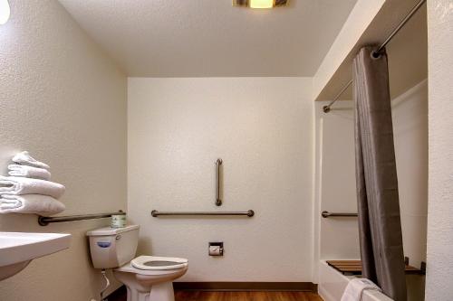a bathroom with a toilet and a sink at Motel 6 King Of Prussia PA in King of Prussia