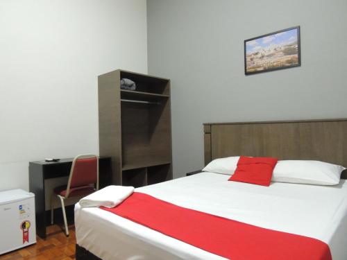 Cama o camas de una habitación en Hotel Gontijo Belo Horizonte - Próximo a Rodoviária e Praça Sete