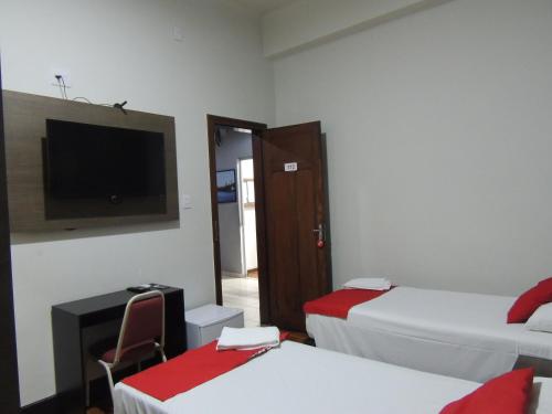 Cama o camas de una habitación en Hotel Gontijo Belo Horizonte - Próximo a Rodoviária e Praça Sete