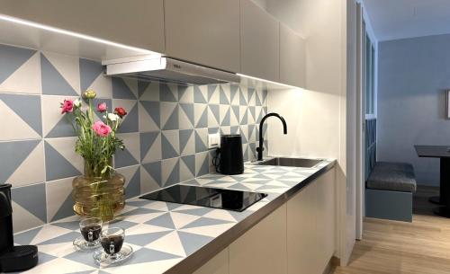 Η κουζίνα ή μικρή κουζίνα στο AIONION RESIDENCES by K&K