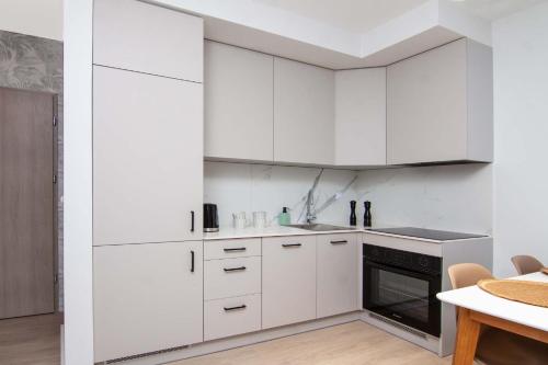 Η κουζίνα ή μικρή κουζίνα στο Apartament Łowca Snów 1