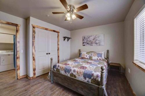 a bedroom with a bed and a ceiling fan at Angel Rock Rentals of Moab Unit 4 in Moab