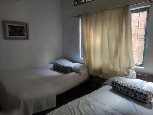 Säng eller sängar i ett rum på Hotel Marqués de San Luis
