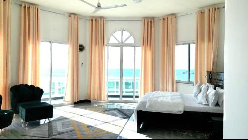 Postel nebo postele na pokoji v ubytování ST Beach Villa