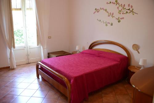 Postel nebo postele na pokoji v ubytování Scatitti House