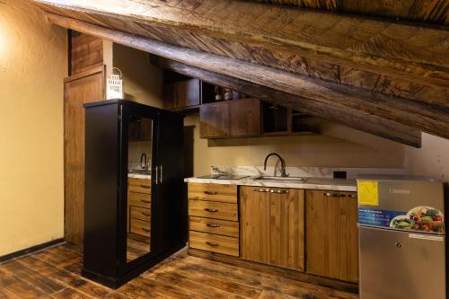 Kuchyň nebo kuchyňský kout v ubytování Rustic House