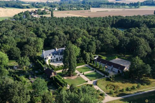 an aerial view of a large house in the woods at Domaine de Poulaines près Valençay Val de Loire Berry in Poulaines