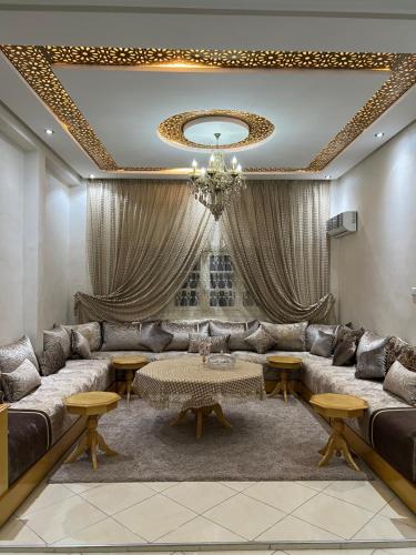a living room with a couch and a table at A room in Guéliz only for ladies in Marrakesh