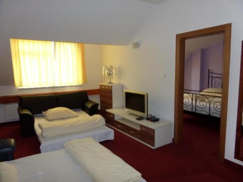 Cama ou camas em um quarto em A 7 - Avenue 7 Penzion