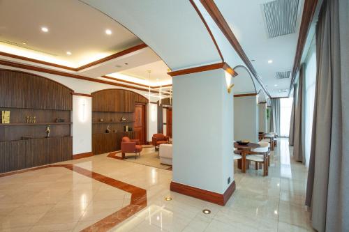 an archway in a lobby with a table and chairs at JW Marriott Quito in Quito