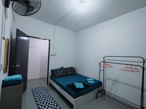 Katil atau katil-katil dalam bilik di D'Aqiela Gayang Homestay