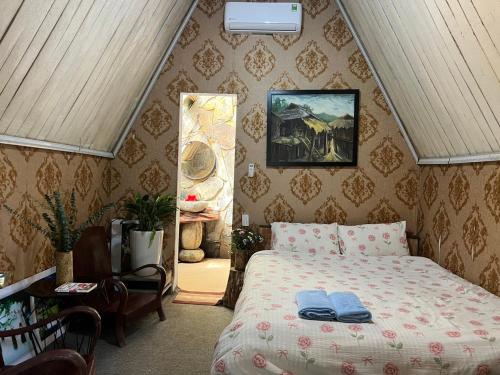 Giường trong phòng chung tại Homestay Điện Biên- Thung Lũng Hoa Hồng