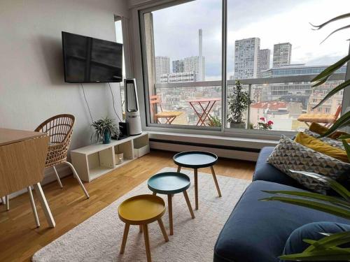 Tour Eiffel - Studio vue imprenable au-dessus des toits, balcon