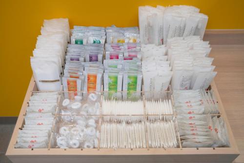 a box filled with lots of different types of toiletries at Hop Inn Tokyo Asakusa in Tokyo