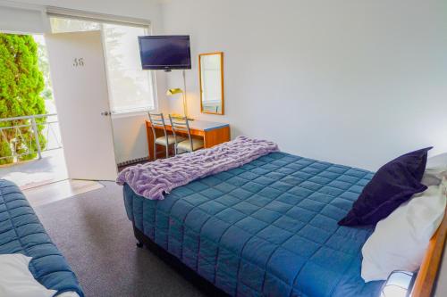 Cama o camas de una habitación en Abbotsleigh Motor Inn