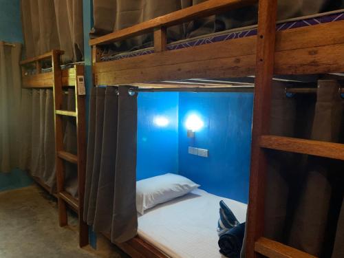 Postel nebo postele na pokoji v ubytování Jaydy hostel