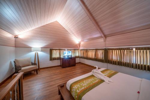Letto o letti in una camera di Three Brothers Bungalows & Villas