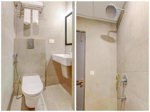 a bathroom with a toilet and a sink at HOTEL CHETRAM ELITE near railway station in Jaipur