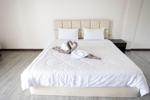 Ein Bett oder Betten in einem Zimmer der Unterkunft MountainviewKhaoyai