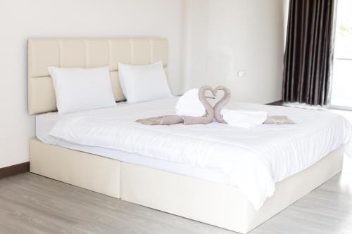 Ein Bett oder Betten in einem Zimmer der Unterkunft MountainviewKhaoyai