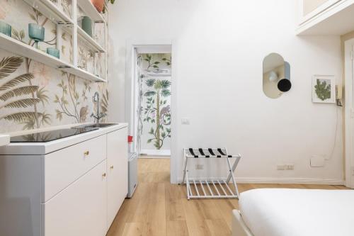 Ένα ή περισσότερα κρεβάτια σε δωμάτιο στο Leonina Apt - Colosseum