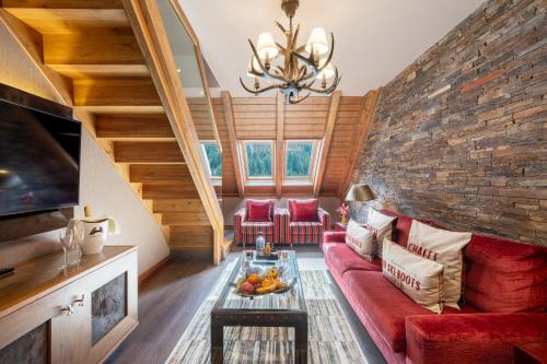 Posezení v ubytování Hotel Val de Neu G.L.