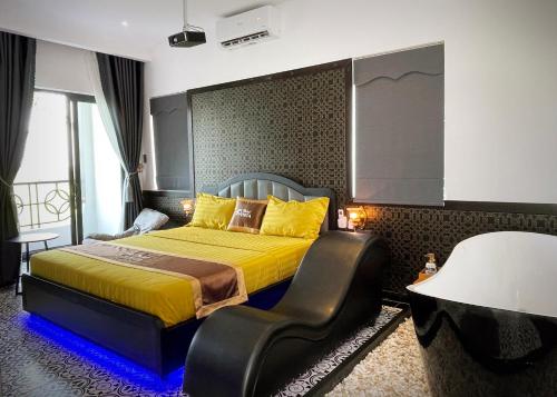 Katil atau katil-katil dalam bilik di Punita Hotel