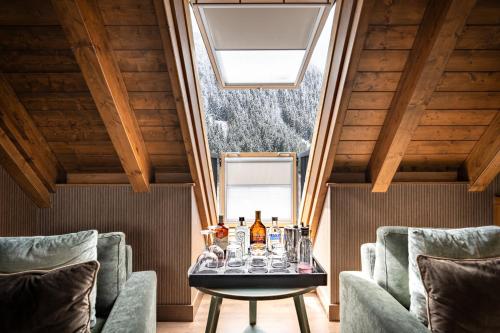 Posezení v ubytování Hotel Val de Neu G.L.