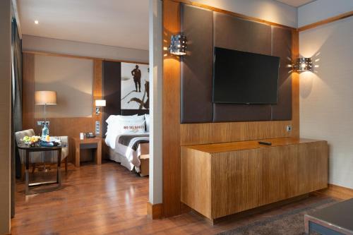 Postel nebo postele na pokoji v ubytování Hotel Val de Neu G.L.