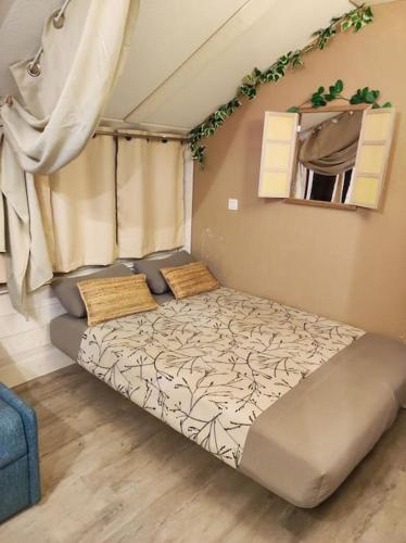 Cette chambre comprend : dans l'établissement Le Cosy Fleuri, à Ustou