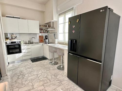 Kuchyň nebo kuchyňský kout v ubytování Gigi's Place