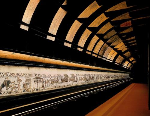 a subway tunnel with a painting on the wall at Les Tourelles Village de vacances in Asnelles
