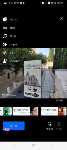 a page of a website with a picture of a building at La Casetta in Nazareth