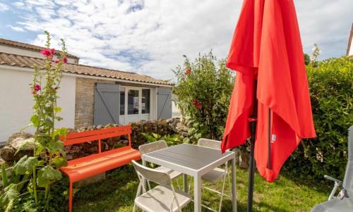 Photo de la galerie de l'établissement La Maison d'Odile, à Grand-Village-Plage