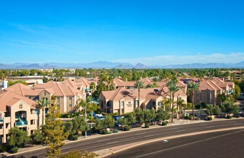 an aerial view of a city with palm trees and houses at Hyatt House Scottsdale Old Town in Scottsdale
