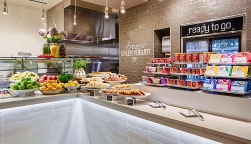 a grocery store with fruits and vegetables on display at Hyatt Place Chicago River North in Chicago