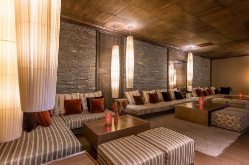 Posezení v ubytování Hotel Val de Neu G.L.